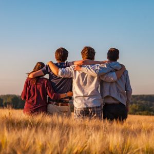 unknown persons standing outdoors